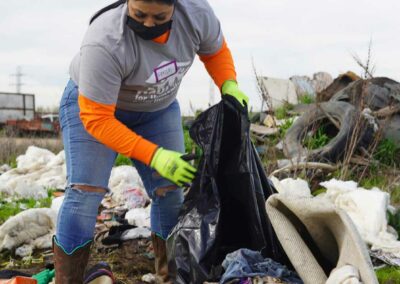 Volunteer picking up trash