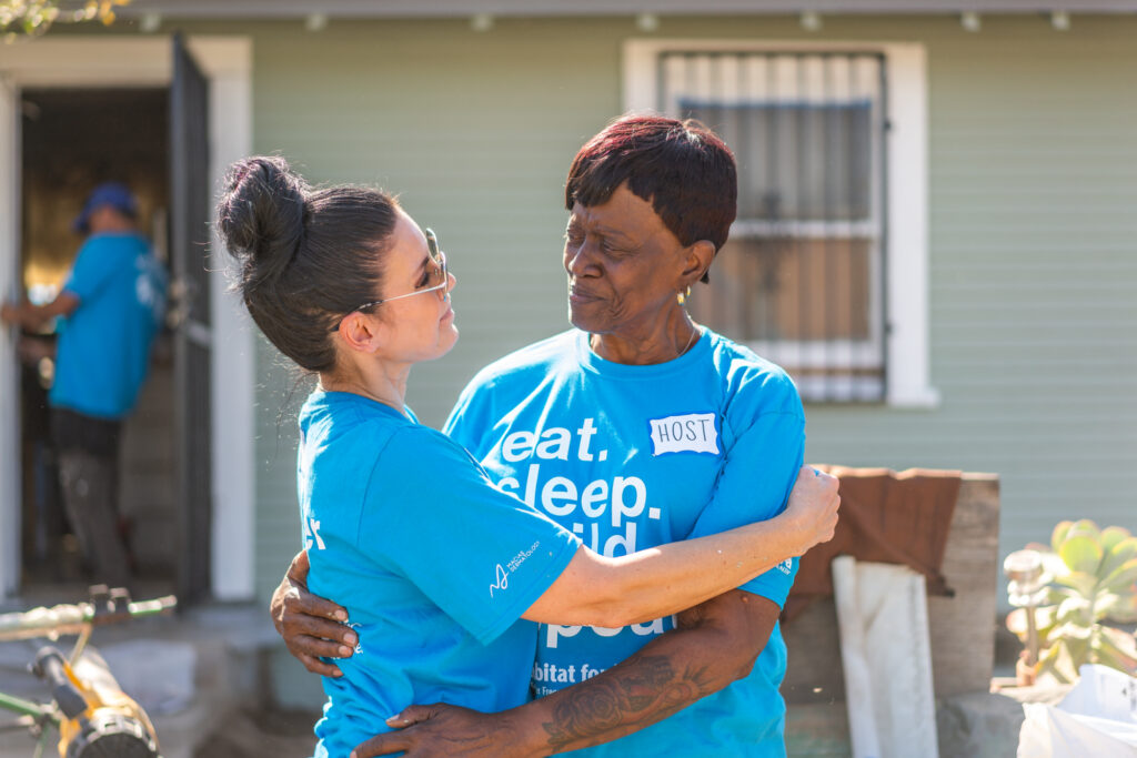 SeniorPaint-McPeters-79 A volunteer embracing a homeowner