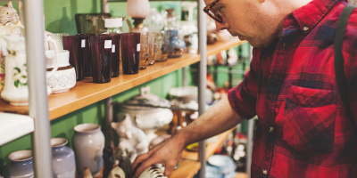 Man looking at items on shelf