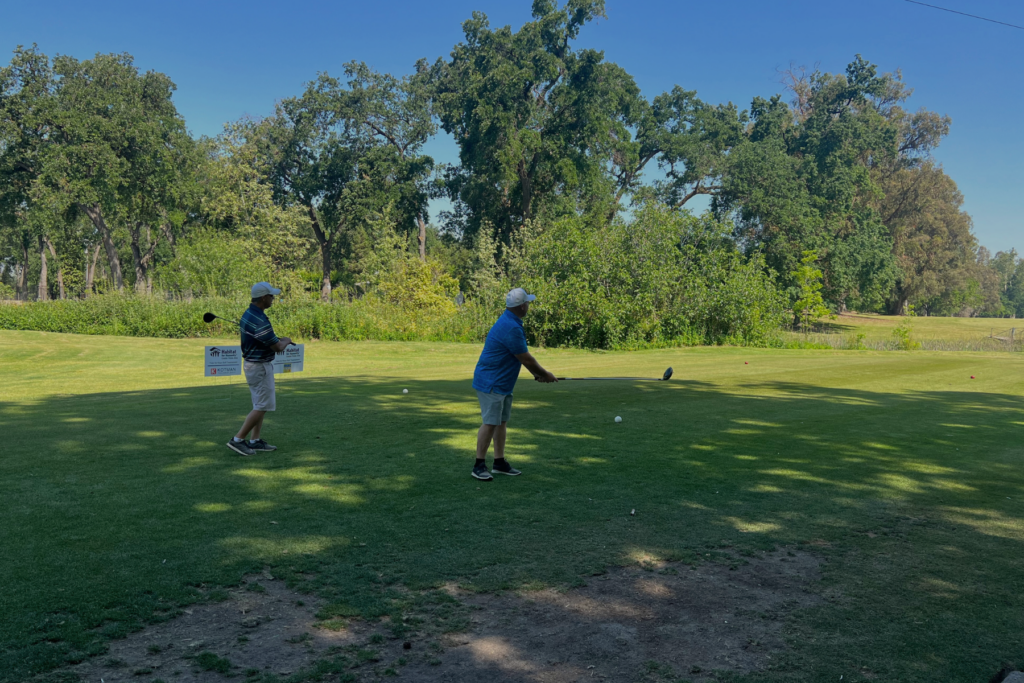 T4K Golfers A golfer hitting the ball.