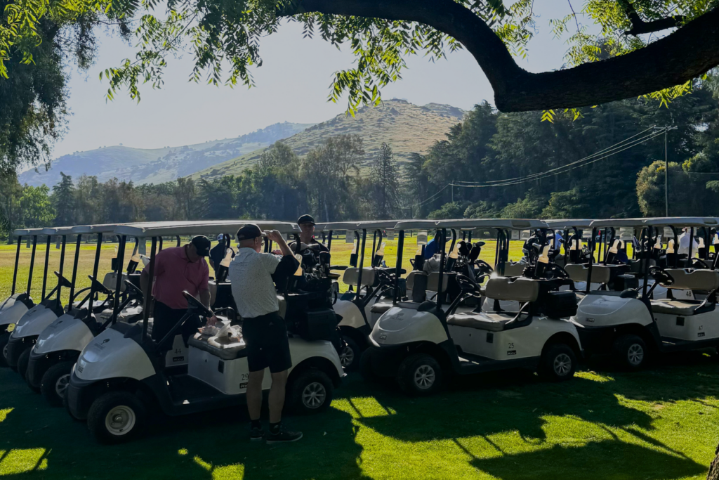 T4K1 Golf course with golf carts lined up.